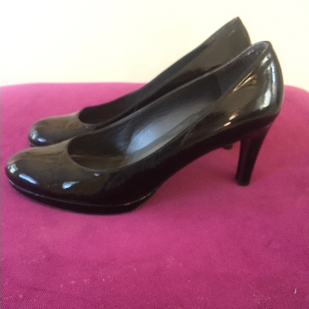Stuart Weitzman Patent Leather Round Toe Pump.
